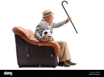 excited-elderly-man-watching-football-and-cheering-isolated-on-white-H29M6D.jpg